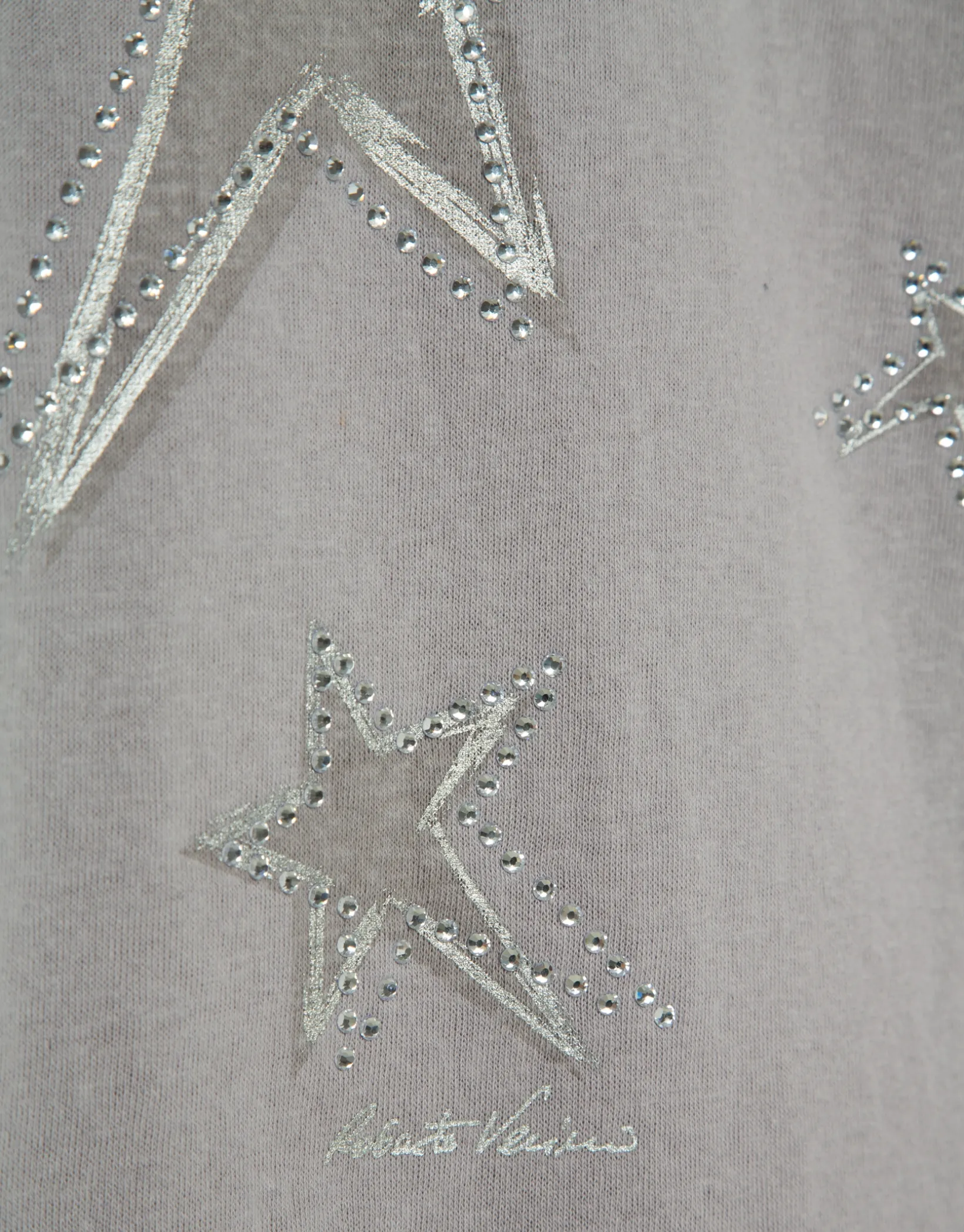 Camiseta punto ligero estampado estrellas plata