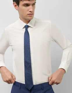 Corbata de seda azul con jacquard geométrico plata