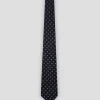 Corbata seda marino jacquard óvalos plata