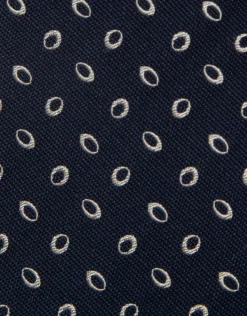Corbata seda marino jacquard óvalos plata