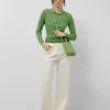 Pantalón vaquero ancho beige con bordados florales