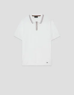 Polo tricotado blanco con rayas en cuello y puños