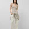 Top sisas punto calado con lúrex beige