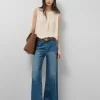 Top tejido fluido beige con bordado floral