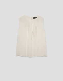 Top tejido fluido beige con bordado floral