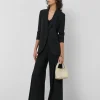 Blazer smoking crepé negro