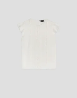 Blusa manga corta blanco roto con mini volantes en delantero