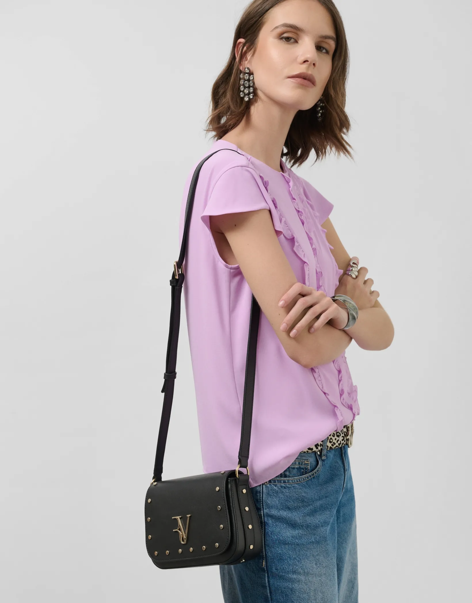 Blusa manga corta rosa con mini volantes en delantero