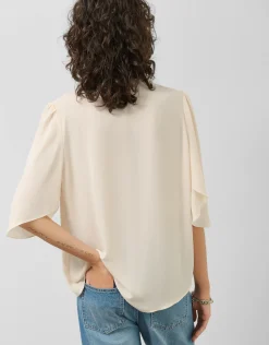 Blusa manga volante tejido fluido beige