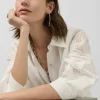 Blusa oversize con diseño floral en devoré crudo
