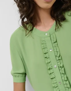 Blusa tejido fluido verde con volante delantero