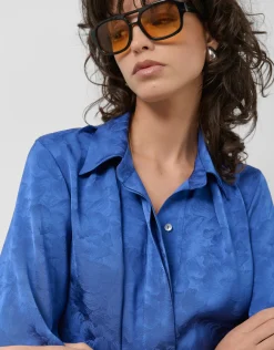 Blusón azul intenso con damasco floral