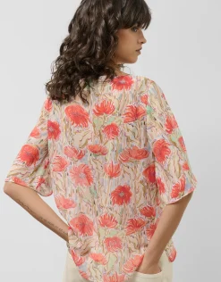 Blusón en gasa estampado vegetal floral tonos coral y rojo