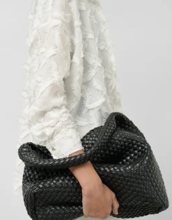 Blusón en voile de algodón blanco con fill coupé plumas