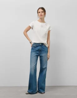 Camiseta algodón blanco con flores bordadas