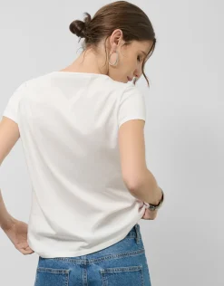 Camiseta algodón blanco con flores bordadas