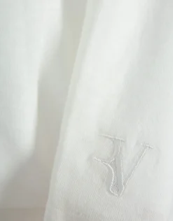 Camiseta cuello pico punto ligero blanco melange
