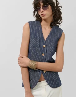Chaleco azul vaquero con lino y perfil dorado