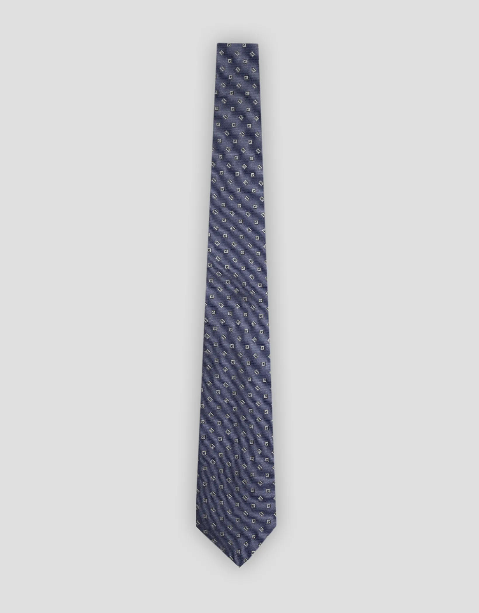 Corbata seda azul con jacquard cuadrados plata