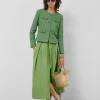 Falda larga en tafeta verde con abertura delantera
