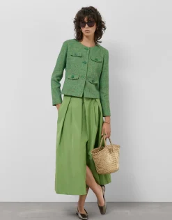 Falda larga en tafeta verde con abertura delantera