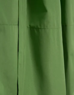 Falda larga en tafeta verde con abertura delantera
