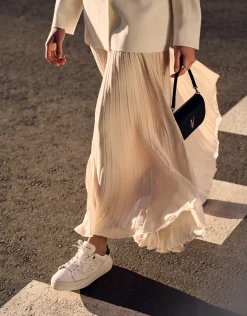 Falda midi plisada tejido fluido beige