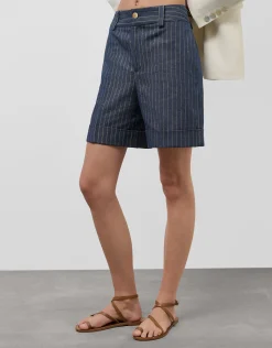 Pantalón bermuda en tejido vaquero con lino y perfil dorado