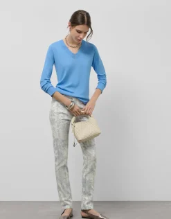 Pantalón cinco bolsillos blanco animal print azul grisáceo