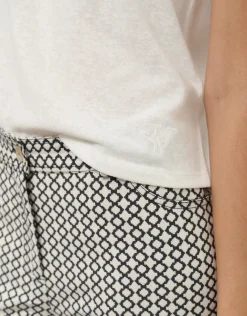 Pantalón recto jacquard geométrico blanco y negro