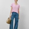 Pantalón vaquero ancho azul con bordados florales