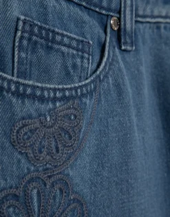 Pantalón vaquero ancho azul con bordados florales