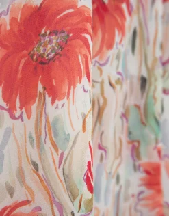 Vestido camisero en gasa estampado vegetal floral tonos coral y rojo