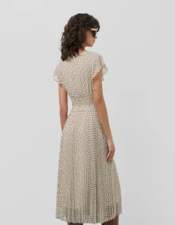 Vestido midi falda plisada estampado geométrico blanco y negro