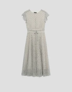 Vestido midi falda plisada estampado geométrico blanco y negro